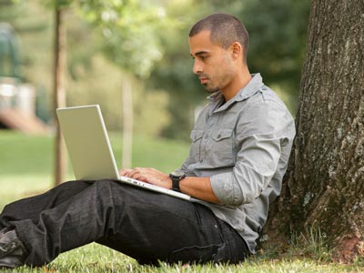 Person on his computer in isolation